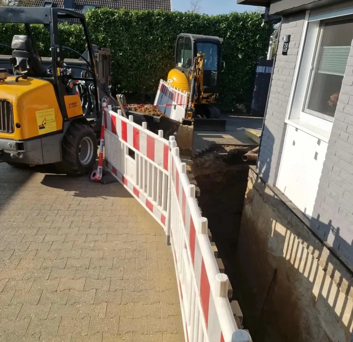 Baggerarbeiten an einem Wohnhaus